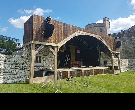 8m arc roof dressed as medieval stage in Tower of London moat.